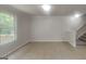 Spacious living room with large windows and tile flooring at 1699 Redan West, Lithonia, GA 30058