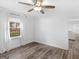 Spacious bedroom with hardwood floors and backyard view at 1200 Mount Carmel Rd, Mcdonough, GA 30253