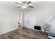 Well-lit bedroom with hardwood floors and access to other rooms at 1200 Mount Carmel Rd, Mcdonough, GA 30253