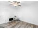 Bright bedroom with hardwood floors and ceiling fan at 1200 Mount Carmel Rd, Mcdonough, GA 30253