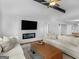 Living room with a fireplace and built-in shelving at 1200 Mount Carmel Rd, Mcdonough, GA 30253