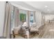 Cozy sitting area with bay window, comfy armchairs, and views of the backyard deck at 1200 Mount Carmel Rd, Mcdonough, GA 30253