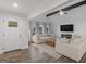 Spacious living area featuring a fireplace and large windows at 1200 Mount Carmel Rd, Mcdonough, GA 30253