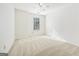 Simple bedroom with carpeted floor and window at 3811 Breneau Ct, Decatur, GA 30034