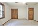 Bedroom with carpet, doors and window at 215 Kingswood Dr, Fayetteville, GA 30215