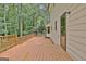 Deck with access from the house and a view of the woods at 215 Kingswood Dr, Fayetteville, GA 30215