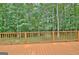 Large stained wood deck, great for outdoor entertaining and relaxing at 215 Kingswood Dr, Fayetteville, GA 30215