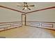 Spacious dining room with hardwood floors and ceiling fan at 215 Kingswood Dr, Fayetteville, GA 30215