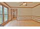 Sunlit dining room, hardwood floors, and view of entryway at 215 Kingswood Dr, Fayetteville, GA 30215