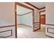 Open living room with hardwood floors and wood trim at 215 Kingswood Dr, Fayetteville, GA 30215