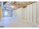 Unfinished basement with high ceilings and ample space at 169 Holly Ct, Loganville, GA 30052