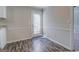 Bright dining area with wood-look flooring and access to a patio at 169 Holly Ct, Loganville, GA 30052