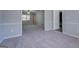 View of living room from dining area at 169 Holly Ct, Loganville, GA 30052