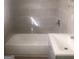 Clean bathroom with tile surround and vanity at 2176 Lilac Ln, Decatur, GA 30032