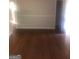 Bright dining room with hardwood floors and neutral walls at 2176 Lilac Ln, Decatur, GA 30032