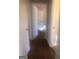 Hardwood floor hallway with access to bedrooms at 2176 Lilac Ln, Decatur, GA 30032