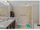 Bathroom with double vanity, shower and tub at 149 Pristine Dr, Locust Grove, GA 30248
