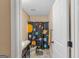 Full bathroom with dark vanity and solar system decor at 149 Pristine Dr, Locust Grove, GA 30248