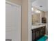 Clean bathroom with double vanity and a bathtub at 149 Pristine Dr, Locust Grove, GA 30248