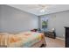 Cozy bedroom with a ceiling fan at 149 Pristine Dr, Locust Grove, GA 30248
