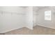 Spacious walk-in closet with ample shelving at 113 Broder Farms Dr # 387, Stockbridge, GA 30281