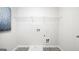 Laundry room with shelving and hookups at 113 Broder Farms Dr # 387, Stockbridge, GA 30281