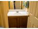 Bathroom featuring a sink with wooden cabinets, offering a clean and functional space at 106 Gwenellen Dr, Locust Grove, GA 30248