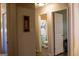 View of a neutral toned bathroom featuring a shower curtain and wood look flooring at 106 Gwenellen Dr, Locust Grove, GA 30248