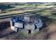 Enjoy outdoor gatherings around this rustic brick fire pit, perfect for cool evenings and creating lasting memories at 106 Gwenellen Dr, Locust Grove, GA 30248