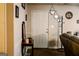Inviting entryway featuring a charming decor and a convenient coat rack for a welcoming first impression at 106 Gwenellen Dr, Locust Grove, GA 30248
