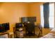 Bedroom converted to office with two monitors and printer near the window at 106 Gwenellen Dr, Locust Grove, GA 30248