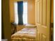 Cozy bedroom featuring a window, desk, and neutral-toned walls at 106 Gwenellen Dr, Locust Grove, GA 30248