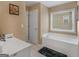 Bathroom with a bathtub and window at 7356 Blue Jay Way, Union City, GA 30291