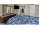 Bedroom with floral bedding and closet at 7356 Blue Jay Way, Union City, GA 30291