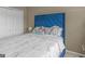 Cozy bedroom with a blue upholstered headboard and a charming Paris-themed bedding set at 7356 Blue Jay Way, Union City, GA 30291