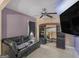 Cozy bonus room features a leather sofa and large TV at 7356 Blue Jay Way, Union City, GA 30291