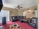 Gathering room with sectional sofa and access to backyard at 7356 Blue Jay Way, Union City, GA 30291