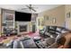 Gathering room with fireplace, large TV, and comfy seating at 7356 Blue Jay Way, Union City, GA 30291