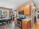 Open concept kitchen with stainless steel appliances and a view of the dining area at 7356 Blue Jay Way, Union City, GA 30291