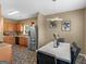 Modern kitchen with stainless steel appliances and light wood cabinets at 7356 Blue Jay Way, Union City, GA 30291