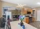Open concept kitchen with stainless steel appliances and a view of the living area at 7356 Blue Jay Way, Union City, GA 30291