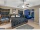 Spacious main bedroom with king-size bed and sitting area at 7356 Blue Jay Way, Union City, GA 30291
