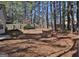 Spacious backyard with wooden privacy fence and mature trees at 901 Arbor Way, Mcdonough, GA 30253