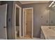 Bathroom with double vanity, toilet, and linen closet at 901 Arbor Way, Mcdonough, GA 30253