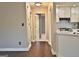 Hardwood floor hallway leading to other rooms at 901 Arbor Way, Mcdonough, GA 30253