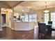 Spacious kitchen with island, stainless steel appliances, and hardwood floors at 901 Arbor Way, Mcdonough, GA 30253