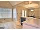 Eat-in kitchen with island, stainless steel appliances, and tile floor at 901 Arbor Way, Mcdonough, GA 30253