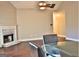 Living room with brick fireplace and hardwood floors at 901 Arbor Way, Mcdonough, GA 30253