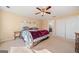 Bright bedroom with king bed and en-suite bathroom at 210 Timber Laurel Ct, Lawrenceville, GA 30043