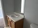 Bathroom vanity with sink and mirror at 9418 Sleepy Hollow Ln, Jonesboro, GA 30238